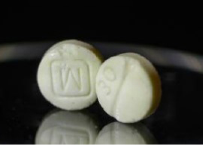 حبة صفراء بحرف M