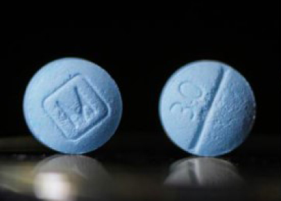 حبة زرقاء بحرف M